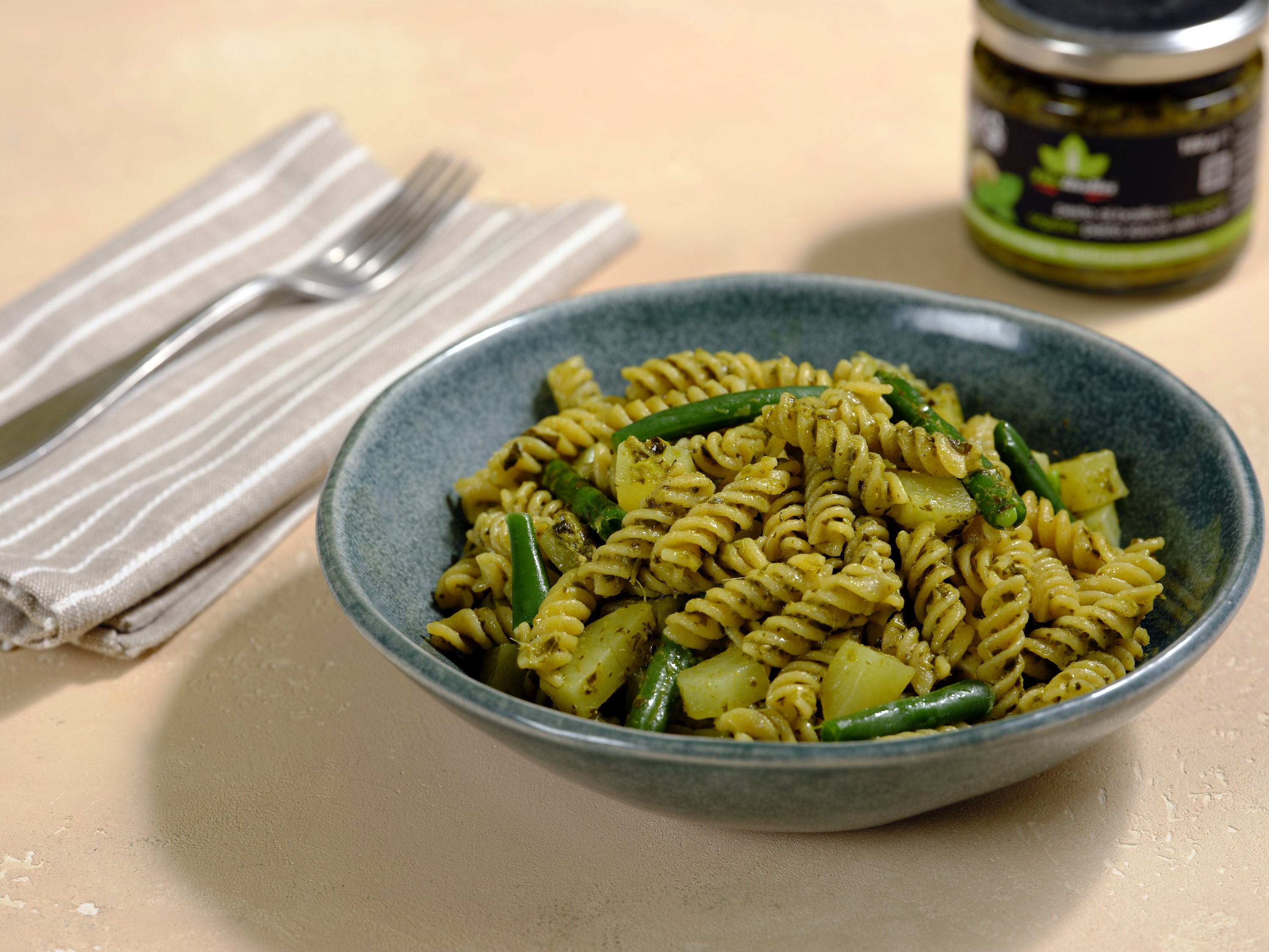 Gluten free fusilli with pesto, potatoes, and green beans